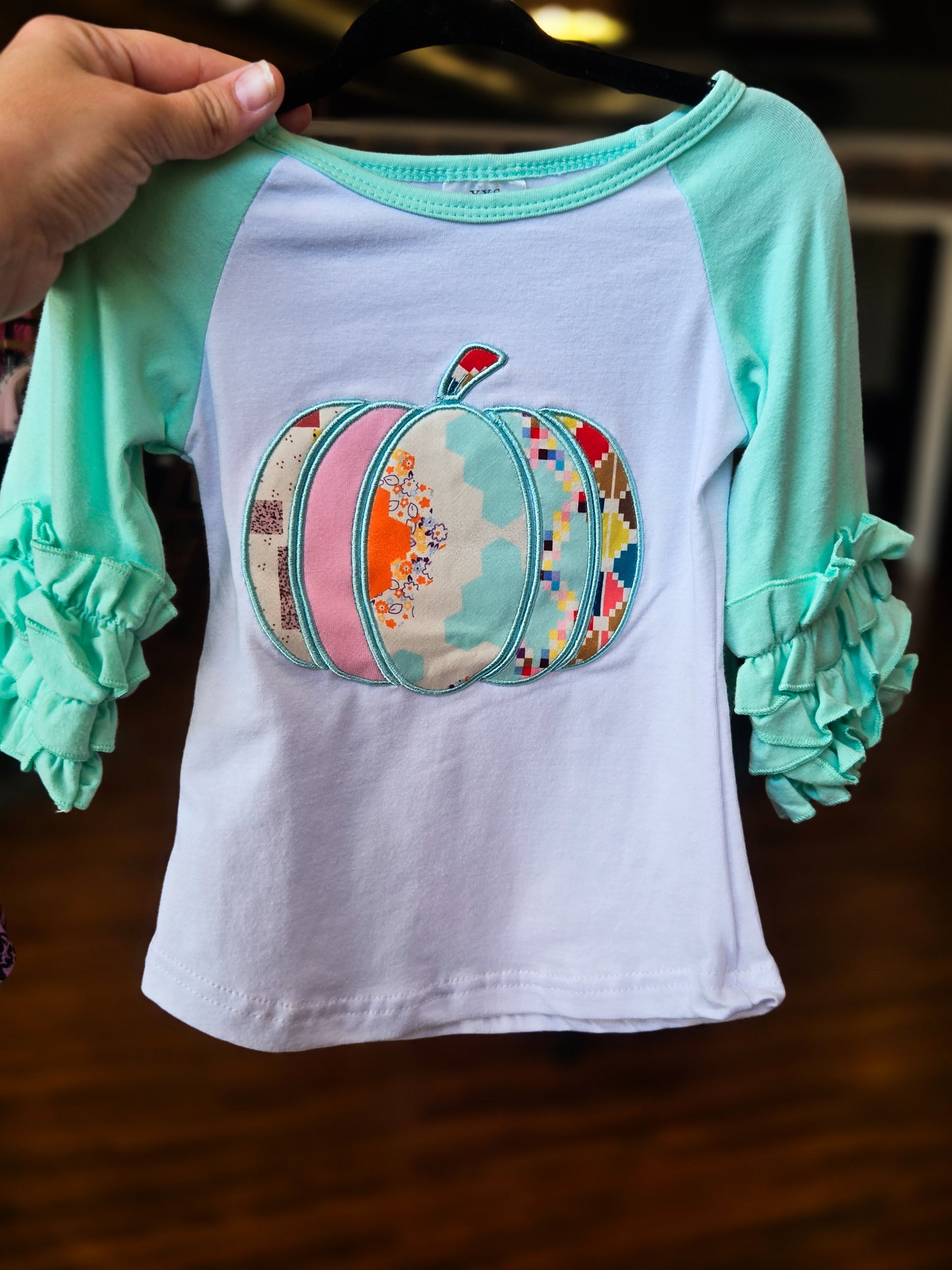 Mint embroidery pumpkin ruffle top