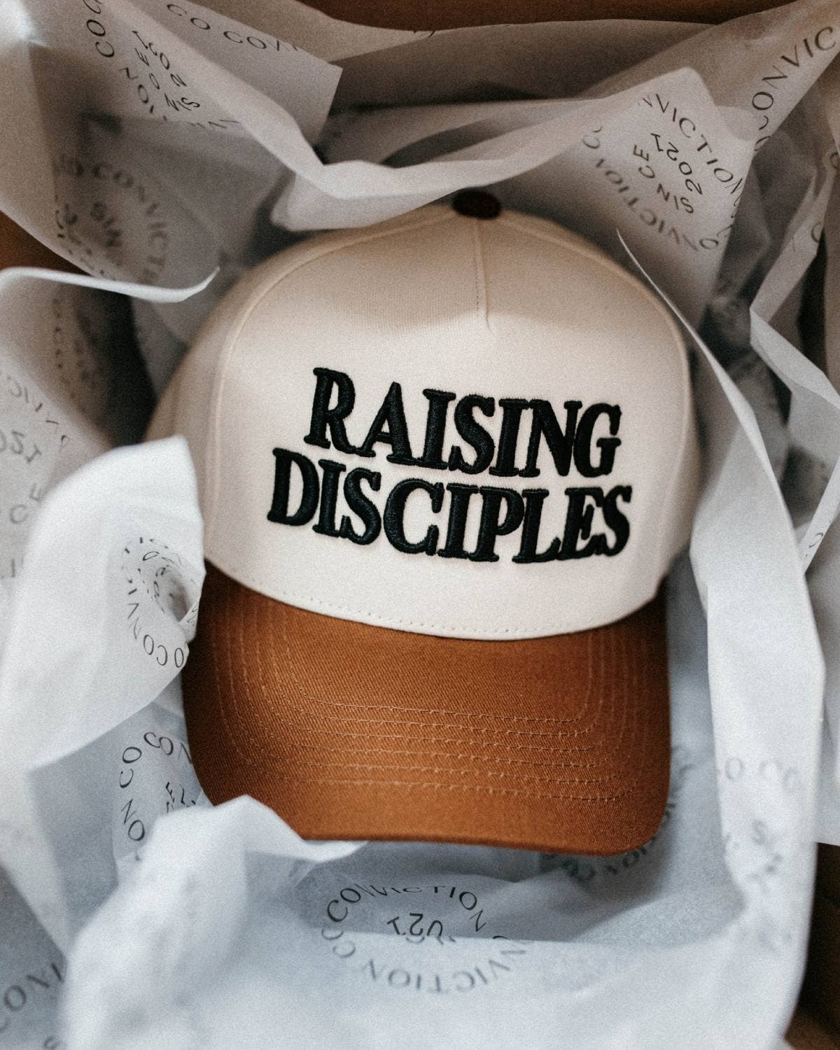 Raising Disciples Unisex Christian Trucker Hat Brown & Black