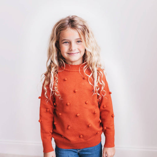 Rust Pom Pom Sweater